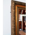 Miroir biseauté ancien avec encadrement en bois doré