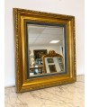 Miroir avec cadre doré en bois