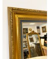 Miroir avec cadre doré en bois